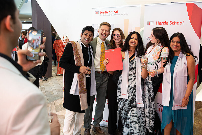 A group of Hertie School students at graduation